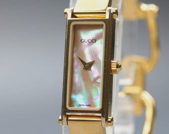 GUCCI 1500L Shell Dial Gold 12mm Bangle Quartz Women's Watch [Near MINT]