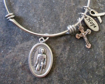 Saint Peregrine stainless steel adjustable bangle bracelet with cross, hope, and ribbon charms Patron Saint of Cancer bracelet