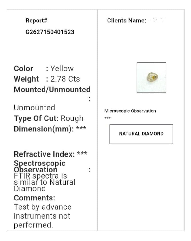 May include: A white document with the report number G2627150401523. The document details a yellow, 2.78-carat unmounted natural diamond. The type of cut is rough. The document includes the text "NATURAL DIAMOND".