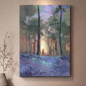 May include: A canvas print of a forest scene with tall trees and a soft, glowing light in the background. The painting has a dreamy, ethereal quality with shades of blue, green, and gold. The artwork is mounted on a wall.