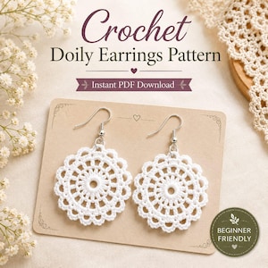 May include: A pair of white crochet doily earrings with silver-toned hooks displayed on a rectangular kraft paper card. The text reads Crochet Doily Earrings Pattern, Instant PDF Download, and Beginner Friendly with a small heart icon.