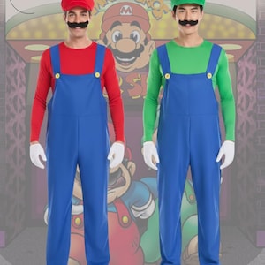 May include: Two Mario Bros costumes. One costume features a red long-sleeve shirt, blue overalls, a red hat with a white "M", a black mustache, and white gloves. The other costume features a green long-sleeve shirt, blue overalls, a green hat with a white "L", a black mustache, and white gloves.