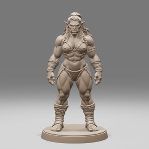 May include: A light brown, unpainted miniature figurine of a muscular humanoid character with pointed ears and long hair tied in a ponytail. The figure wears a simple bikini-style outfit with straps, arm wraps, and leg wraps, standing on a circular base.