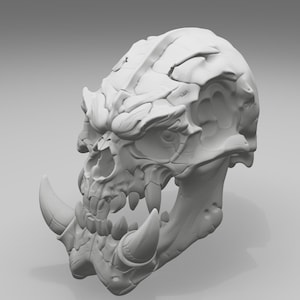 May include: A matte white, three-dimensional sculpted skull of a creature featuring prominent, curved tusks extending from the lower jaw, deep-set eye sockets, and a textured, segmented surface with intricate ridges and bony protrusions.