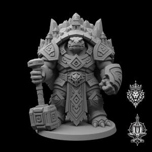 May include: A gray, unpainted resin miniature of a turtle-like humanoid warrior wearing ornate, geometric armor and a shell featuring small architectural structures. The figure holds a large rectangular hammer in one hand and stands on a circular base.