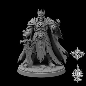 May include: A grey miniature figurine of a skeletal king wearing a crown and ornate armour with skull motifs. The figure holds a large sword in one hand and wears a tattered cape. It stands on a circular base with stone textures and skull details.