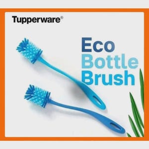 May include: Two blue bottle brushes with light blue bristles are displayed against a white background. The text "Eco Bottle Brush" is visible. The brand name "Tupperware" is in the upper left corner. The brushes have long, curved handles.