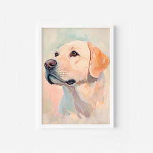 May include: A framed watercolor painting of a yellow Labrador Retriever dog. The dog is depicted in profile, with a soft, painterly style. The background features pastel colors of pink, blue, and green.