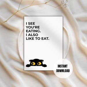 May include: A white card with the text "I SEE YOU'RE EATING. I ALSO LIKE TO EAT." A black cat graphic with yellow eyes peeks from the bottom. A white circle with "INSTANT DOWNLOAD" is on the right.