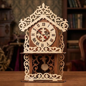 May include: A wooden cuckoo clock with a decorative, openwork design. The clock face features Roman numerals and red clock hands. The clock is made of light and dark brown wood and has a pendulum.