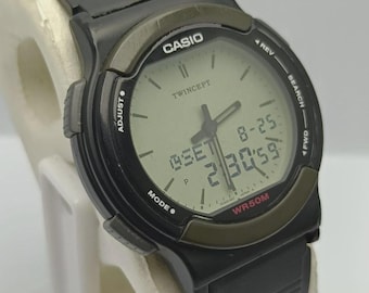 Casio Data Bank Twincept ABX-53 Quartz 1326 Ana Digi World Time