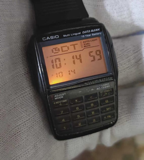 Casio DBC-32 Multi Lingual 2888 Data Bank Calculator Vintage Men