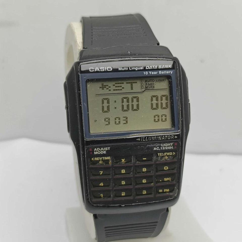 Casio DBC-32 Multi Lingual 2888 Data Bank Calculator Vintage Men