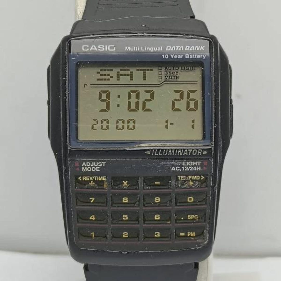 Casio DBC-32 Multi Lingual 2888 Data Bank Calculator Vintage Men's