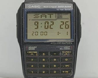 Casio DBC-32 Multi Lingual 2888 Data Bank Calculator Vintage Men