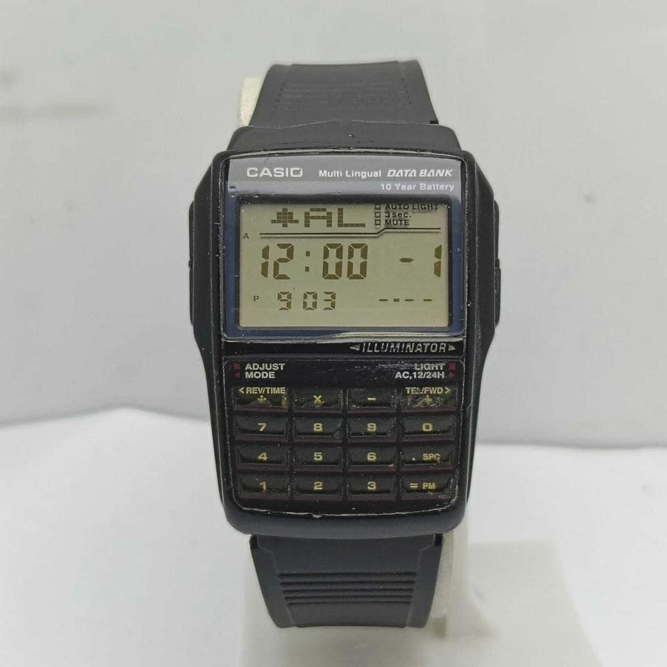 Casio DBC-32 Multi Lingual 2888 Data Bank Calculator Vintage Men's