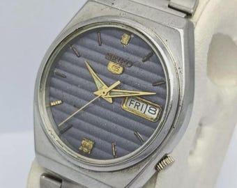 Relógio masculino vintage Seiko 5 Automático Cal.6319 com dia/data e mostrador azul