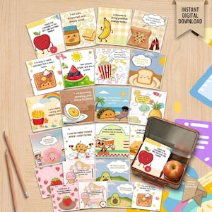 May include: A collection of square cards featuring colourful cartoon illustrations of food items with positive affirmations and speech bubbles, including an apple, banana, taco, and cookie, alongside a metal lunchbox containing a red apple.