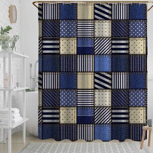 May include: A blue and white patchwork shower curtain with a variety of patterns, including stripes, polka dots, and solid squares. The curtain has a denim-like texture and is stitched together with visible seams. The curtain hangs from a gold-colored rod.