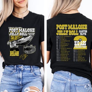 May include: Black t-shirt featuring the text "POST MALONE JELLY ROLL CARTER FAITH" with tour graphics. The back of the shirt displays a tour schedule. The shirt is worn by a person in blue jeans.