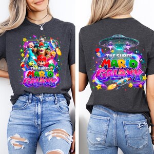 May include: A set of three ceramic mugs with a speckled, matte finish. The mugs are in shades of cream, light gray, and dark gray. Each mug has a simple, minimalist design, perfect for coffee or tea.