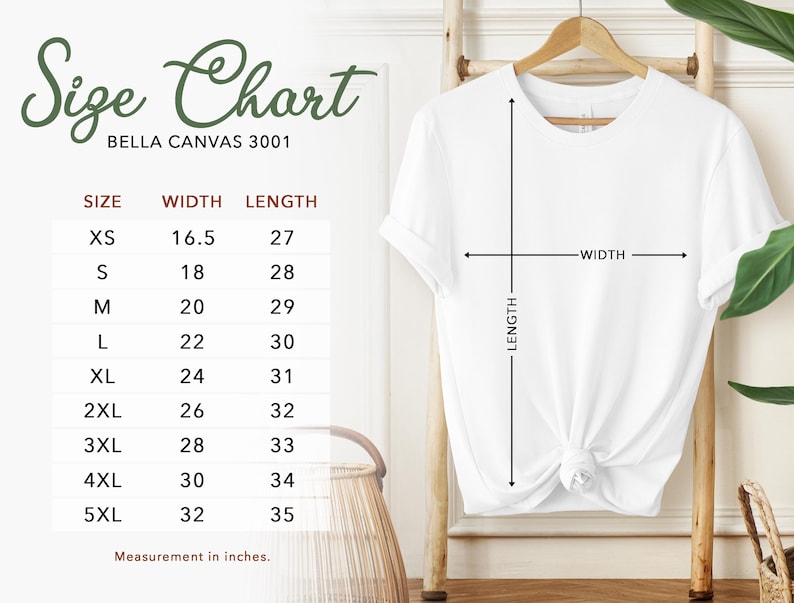 May include: A white t-shirt displayed on a wooden hanger, with a size chart to the left. The chart lists sizes XS to 5XL, with width and length measurements in inches. The text "Size Chart" is at the top, with "BELLA CANVAS 3001" below it.