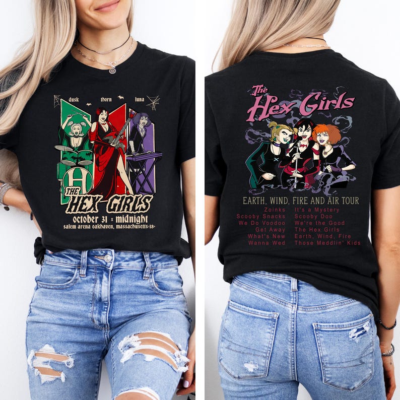 May include: Black t-shirt featuring "The Hex Girls" band graphic. The front design includes band members and text, "October 31 midnight, Salem Arena, Massachusetts." The back displays the band name and tour details.