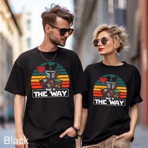 May include: A handmade wooden sign with the text "Welcome" in a playful font. The sign is painted white with a distressed finish, and features a decorative floral design in shades of pink and green. It measures approximately 12 inches wide.