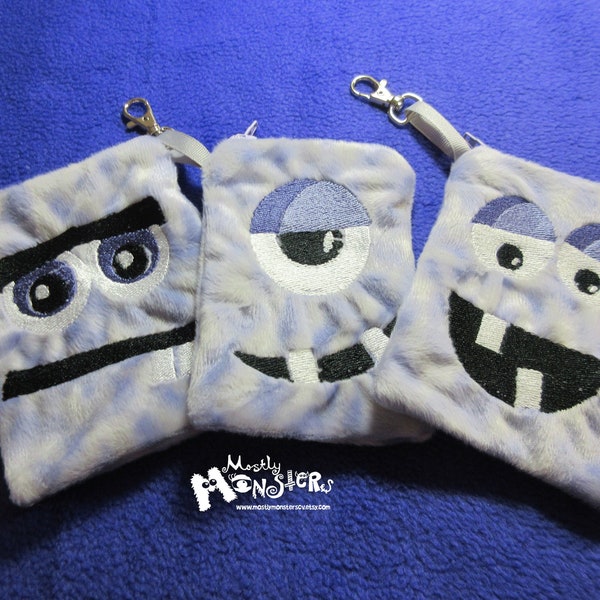 Your choice of Monster Zipper pouch: Embroidered pouch; coin purse; clip-on bag; Periwinkle plush monster; Grumpy Sleepy Goofy monsters