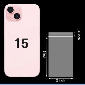 May include: A light pink phone case with the number 15 printed on it, next to a 2 x 3 inch gray plastic bag. The bag is 0.6 inches thick. The phone case has two camera lenses.