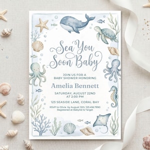 May include: A baby shower invitation with a watercolor design. The invitation features the text "Sea You Soon Baby" and includes illustrations of sea creatures like whales, turtles, and octopuses. The invitation is for Amelia Bennett's baby shower.