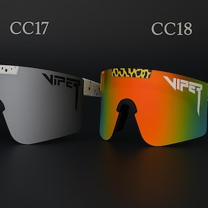 Puede incluir: Dos pares de gafas de sol Viper. Un par tiene una lente gris con detalles moteados blancos y el otro tiene una lente degradada naranja y verde con un estampado de leopardo en la montura. Los textos "CC17" y "CC18" est&aacute;n encima.