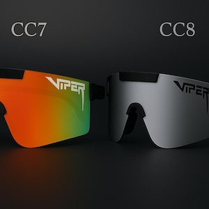 Puede incluir: Se muestran dos pares de gafas de sol Viper. Un par tiene una lente degradada de naranja a verde, el otro una lente plateada. Ambos tienen monturas negras y el logotipo de Viper en blanco.