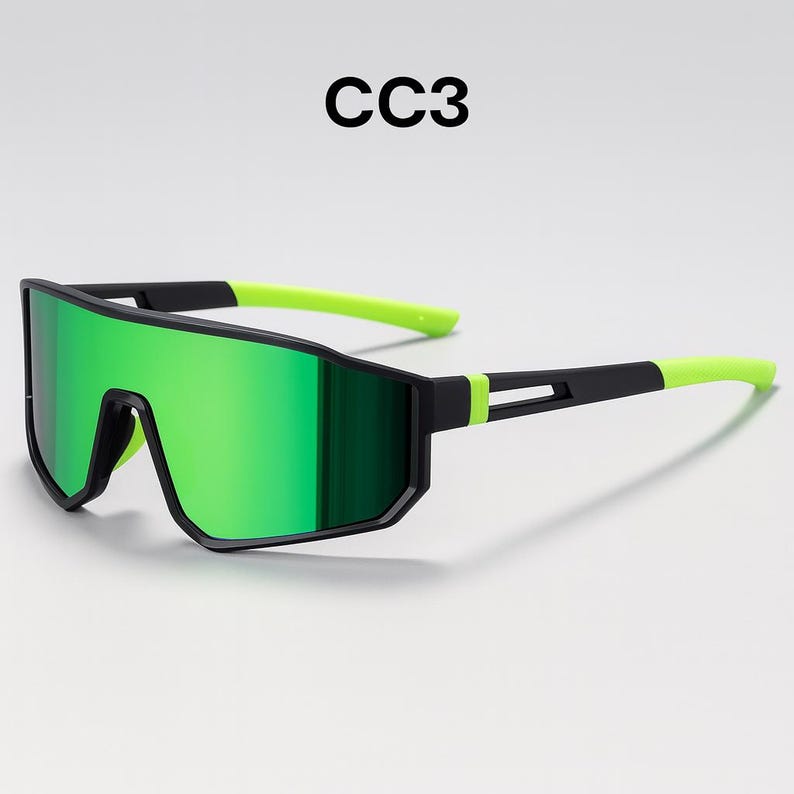 May include: Sport sunglasses with a black frame and bright green mirrored lenses. The arms are black with neon green tips. The text "CC3" is printed above the sunglasses.