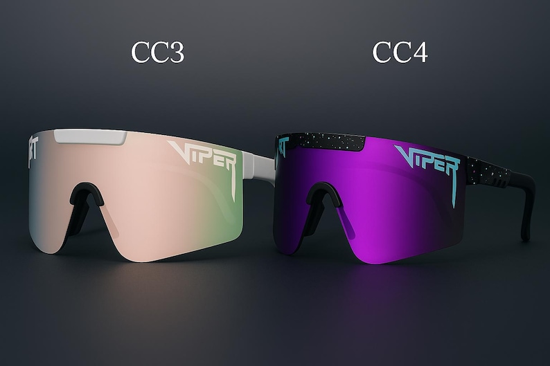 Puede incluir: Dos pares de gafas de sol deportivas. Un par tiene una montura blanca con una lente degradada rosa y verde, y el otro tiene una montura negra con una lente morada. El nombre de la marca "VIPER" est&aacute; impreso en las lentes.