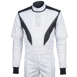 May include: White racing suit with black accents on the shoulders and sides. The suit has a high collar, long sleeves, and a fitted waist. Black cuffs and stitching detail the suit.