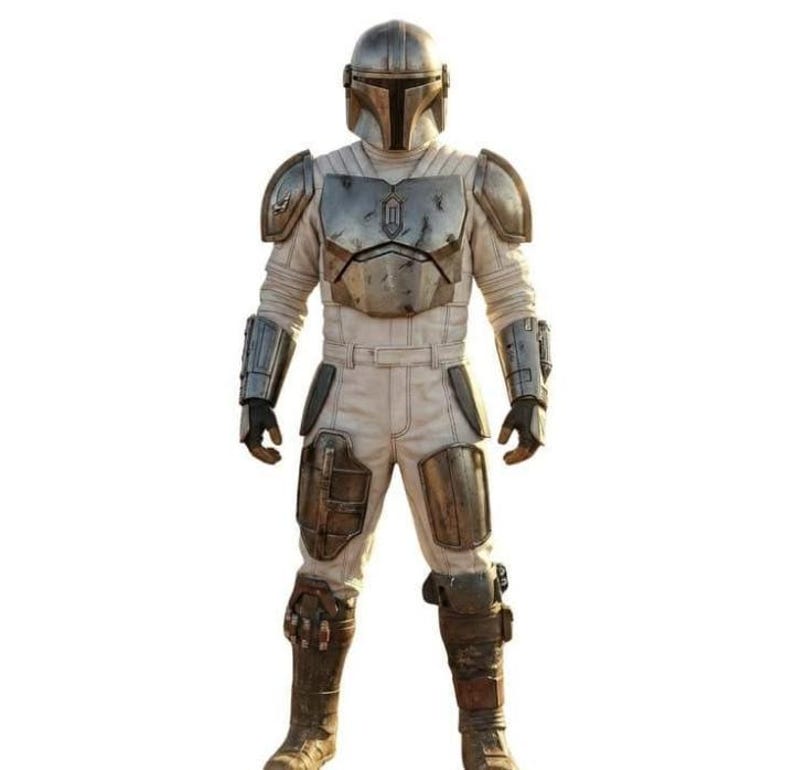 May include: A full-body shot of a Mandalorian-style costume. The armor is a mix of silver and weathered metal plates over a cream-colored jumpsuit. The helmet is silver, and the boots are brown. The costume is designed for protection and combat.
