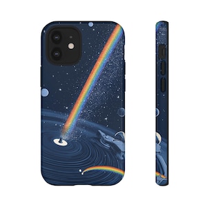 May include: A dark blue phone case featuring a vibrant rainbow arcing from a black hole in space. The design includes stars, planets, and a smaller rainbow. The case wraps around the phone, with a side view showing the design.