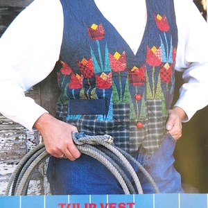 May include: A blue vest with a tulip design. The vest features red, yellow, and green tulip appliqués. The bottom of the vest has a plaid pattern. The text "TULIP VEST" is at the bottom, along with size options and a copyright notice.