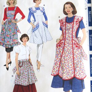 May include: Vintage apron sewing pattern featuring multiple apron designs. The aprons showcase various styles, including floral prints, polka dots, and gingham patterns. The pattern includes sizes A, S, M, and L. The image also includes the text "48 & 52 PATTERN".