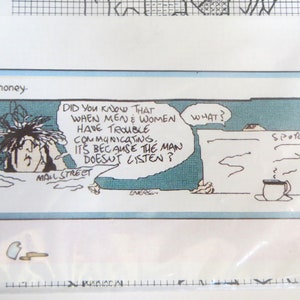 May include: A cartoon illustration of a man and woman having a conversation. The man is saying "What?" and the woman is saying "Did you know that when men and women have trouble communicating, it's because the man doesn't listen?" The woman is labeled "Mall Street" and the man is labeled "Sports".