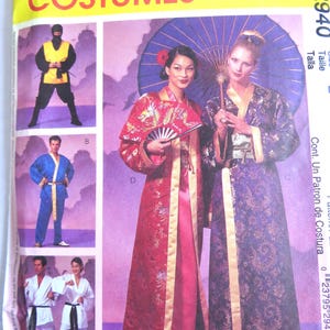 May include: A McCall's Costumes sewing pattern envelope 2940 featuring illustrations of various garments including a red dragon-print robe, a purple floral robe, a blue tunic with gold trim, a black ninja outfit, and white martial arts uniforms.