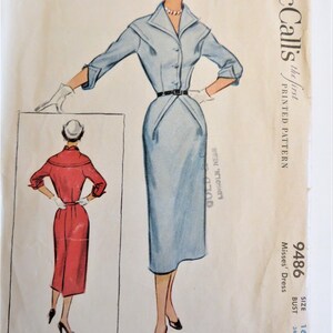 May include: Vintage McCall's sewing pattern for a dress, size 16, bust 34. The pattern is for a blue dress with a collar and a belt. The pattern is printed on a white background with the McCall's logo and the words "the first printed pattern".