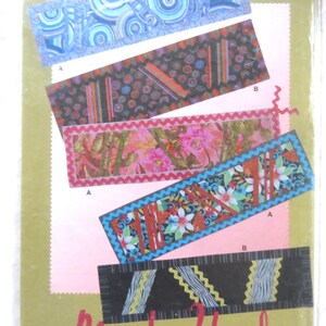 May include: A colourful quilt pattern booklet with the title "Ric Rac Rendezvous" and the name "Maple Island Quilts".