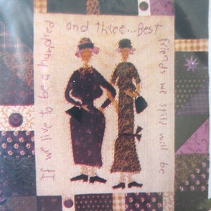 May include: A vintage-style illustration of two women wearing hats and dresses, standing side-by-side. The background is a patchwork of fabric squares in various shades of purple, brown, and white. The text reads "If we live to be a hundred and three... Best friends we still will be."