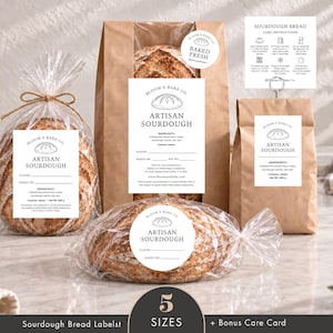 May include: A collection of white paper labels for artisan sourdough bread, featuring the Bloom & Bake Co. logo, ingredient lists, and blank fields for flavour and date. The set includes five distinct label sizes and a sourdough bread care card.