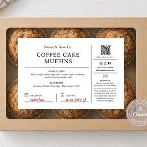 May include: A rectangular brown cardboard box with a clear window containing six coffee cake muffins. A white label features the text Bloom & Bake Co., COFFEE CAKE MUFFINS, ingredients, allergens, storage instructions, and a net weight of 340 g.