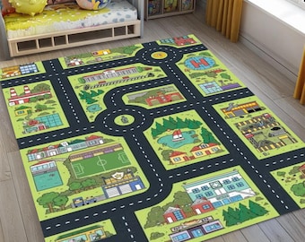 May include: A rectangular play rug featuring a city map design with roads, buildings, and a soccer field. The rug has a green background with black roads and colorful illustrations of houses, shops, and a hospital. The rug is designed for children's play.