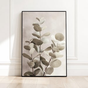Quadro minimalista su tela con eucalipto, foglie botaniche neutre, stampa naturalistica moderna, decorazione dai tenui toni della terra, pronto per essere appeso.