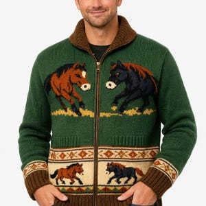 May include: Green zip-up sweater with a brown collar and cuffs. The sweater features a horse design in brown and black. The bottom of the sweater has a cream-colored band with a geometric pattern and horse silhouettes.